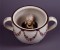 Chamberpot with head of Napoleon. Royal Pavilion & Museums, Brighton & Hove, Image released under CC-BY-NC-SA licence.