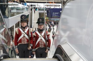 Two, 200 year old soldiers get to grips with using an escalator in Waterloo Station. Photographer: Sergeant Rupert Frere RLC