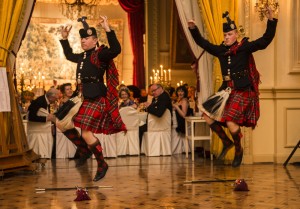 The Scots Guards Pipes and Drums perform while Scots Guards perform sword dance. Photographer: Sergeant Rupert Frere RLC