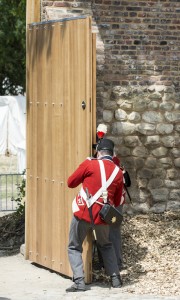 In a powerful re-enactment which illustrated a deliberate reversal of the actions undertaken by their predecessaors 200 years ago, ten Guardsmen from No 7 Company Coldstream Guards, dressed for the occasion in 1815 period costume, carried out the official opening of the Gate. 200 years since the eve of the Battle of Waterloo, Their Royal Highnesses The Prince of Wales and the Duchess of Cornwall attended a special ceremony at the Belgian Farm Wellington claimed was instrumental in his victory. Descendants of those who fought on both sides of historyÕs bloodiest Battle: The present day Duke of Wellington, Prince Nikolaus von Blcher of Prussia and Prince Charles Bonaparte, came together for the Opening Ceremony of the restored Hougoumont Farm which was a focal point for the BattleÕs fiercest and most sustained fighting. They were joined today by Her Royal Highness Princess Astrid of Belgium. The Prince of Wales and The Duke of Wellington also unveiled a new monument to commemorate all the British soldiers who fought at Waterloo. Hougoumont Farm played a critical role in the outcome of the Battle of Waterloo. Hougoumont was a grand 17th century Manor House with a walled garden, orchard and a working farm attached. The Battle of Waterloo began here as Napoleon's brother, Prince Jerome, attacked through the woods to the south confronting British and Hanovarian troops in the garden and orchard, and British Coldstream and Scots Guards in the farm and chateau Photographer: Sergeant Rupert Frere RLC