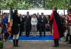 Two historical re-enactors present the replica Eagle standards to Her Royal Highness The Princess Royal. Photographer: Sergeant Rupert Frere RLC