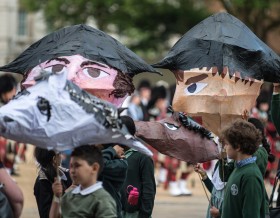 Children from local schools made giant historical puppets to accompany the New Waterloo Dispatch. Photographer: Sergeant Rupert Frere RLC