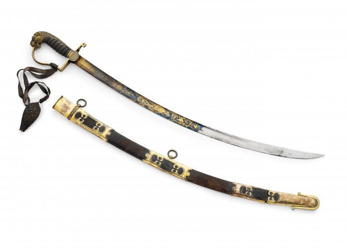 a photo of a sword and scabbar with gilt decoration