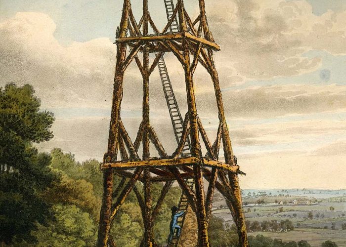 a print of a large wooden tower with ladders leading to an observation platform at the top