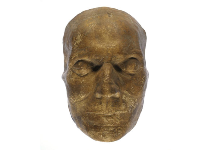 A brown death mask showing the shape and contours of James Hope's face