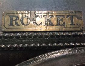photo of the brass name plate 'Rocket' on Stephenson' Rocket