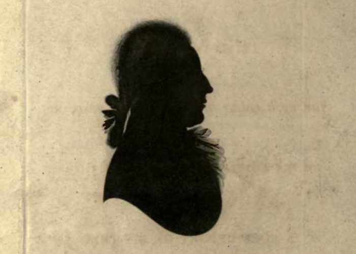 A scan of a page from a book. The page is blank except for a black silhouette of a man in the centre of the page. The silhouette is in profile but the man's ponytail hairstyle can be made out. Beneath the silhouette is the name 'Thomas Muir' in handwriting.