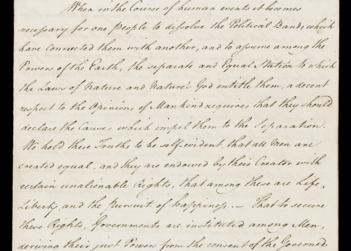 A high resolution photograph of the declaration of American independence. The declaration is handwritten in black ink on a piece of yellowed parchment.