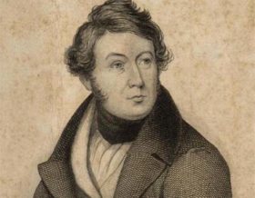 an engraving of a Victorian gentleman with folded arms holding a rolled paper with the words Chartism written on it