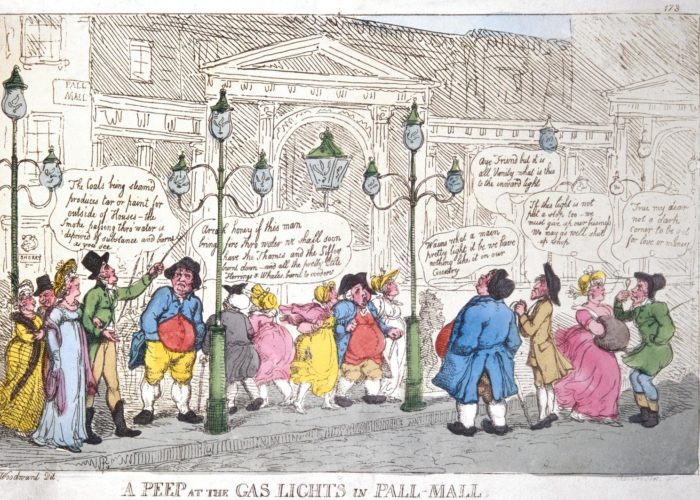 A linograph picture showing a crowd of colourfully dressed people admiring some gas street lighting