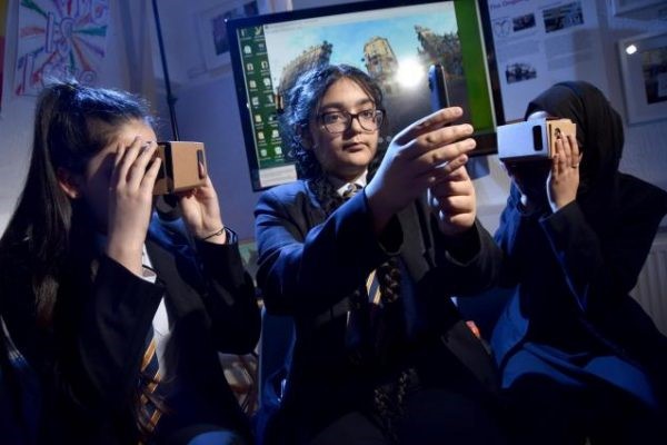 three girls with cardboard VR devices